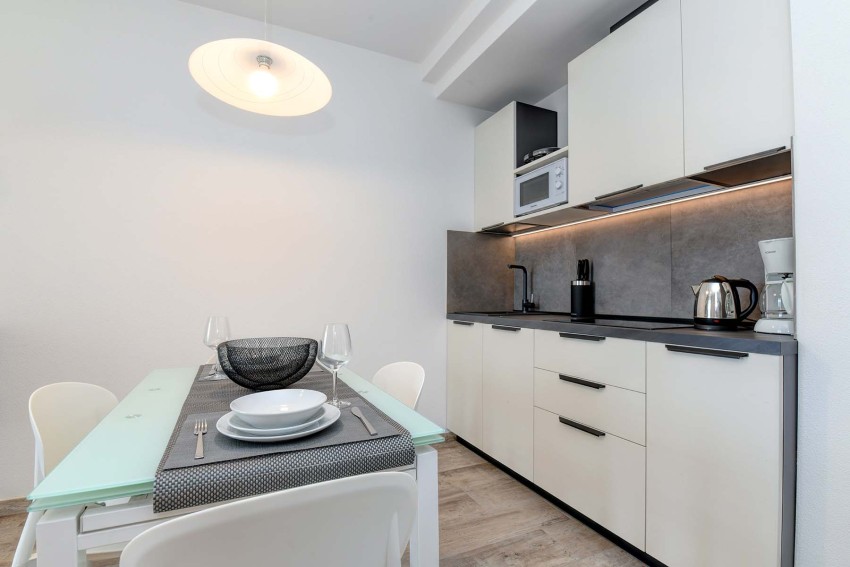 Modern kitchen and dining table near Lago di Garda